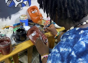 Nigerian artist, Adeyemi Oluwajuwonlo paints recycled plastic to produce artworks at her studio in Lagos, Nigeria November 12, 2022.