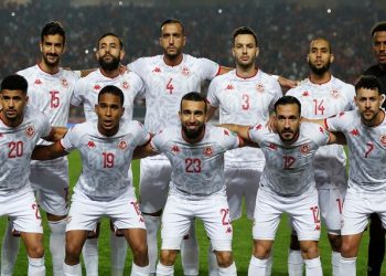 Tunisia players pose for a team photo before the match against Mali.