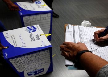 Election officials seal ballot boxes at the end of voting in South Africa's parliamentary and provincial elections at a polling station in Johannesburg, South Africa, May 8,2019.