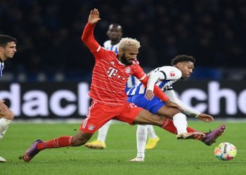 Bayern Munich's Eric Maxim Choupo-Moting in action with Hertha BSC's Jean-Paul Boetius.