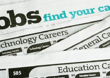 A newspaper with job listings.