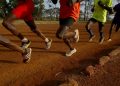 FILE PHOTO: Athletes exercise in the early morning in the sports ground of the University of Eldoret in western Kenya, March 21, 2016.