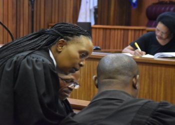 Advocate Zandile Mshololo is seen consulting with legal counsel during the Senzo Meyiwa murder trial at the Nort Gauteng High Court in Pretoria on 13 September 2022.