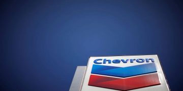 The logo of Dow Jones Industrial Average stock market index listed company Chevron (CVX) is seen in Los Angeles, California, United States, April 12, 2016.