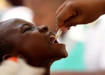 A child receives a cholera vaccination at a clinic in Harare