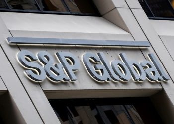 FILE PHOTO: The S&P Global logo is displayed on its offices in the financial district in New York City, U.S., December 13, 2018.