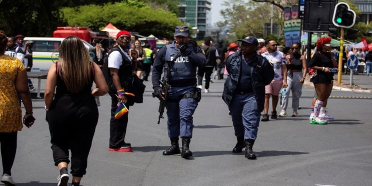 South African police officers patrol the Johannesburg Pride celebration which proceeded despite the reported threat of a terror attack in Sandton, Johannesburg, South Africa October 29, 2022.