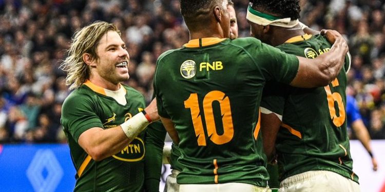 Springboks celebrate Siya Kolisi's try against France.