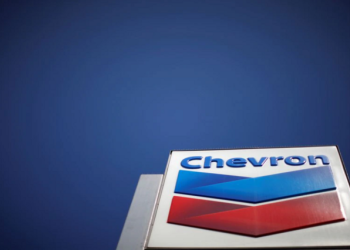 The logo of Dow Jones Industrial Average stock market index listed company Chevron is seen in Los Angeles, California, United States, April 12, 2016.