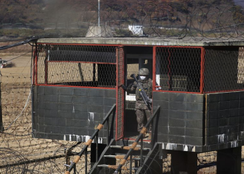 A South Korean soldier stands guard at a guard post near the demilitarized zone separating the two Koreas, in Paju, South Korea