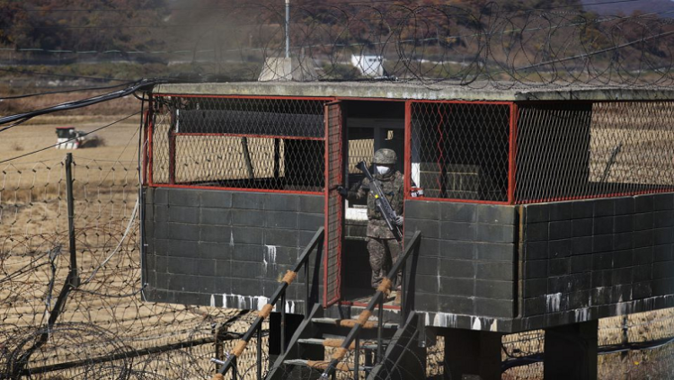 A South Korean soldier stands guard at a guard post near the demilitarized zone separating the two Koreas, in Paju, South Korea