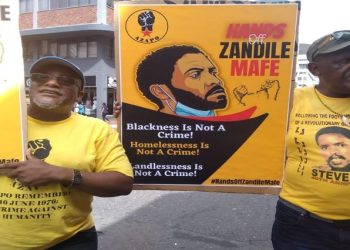 AZAPO members demonstrate outside the High Court in Cape Town in support of the alleged Parliament arsonist, Zandile Mafe, January 15, 2022.