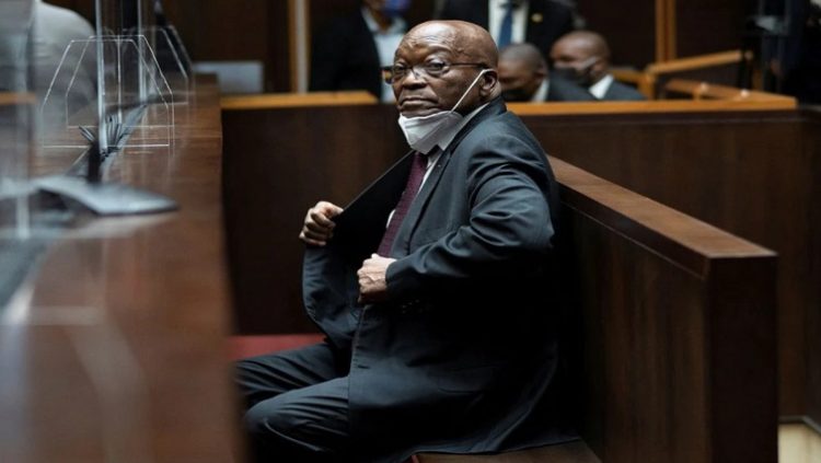 Former President Jacob Zuma sits in court during his corruption trial in Pietermaritzburg, October 26, 2021.