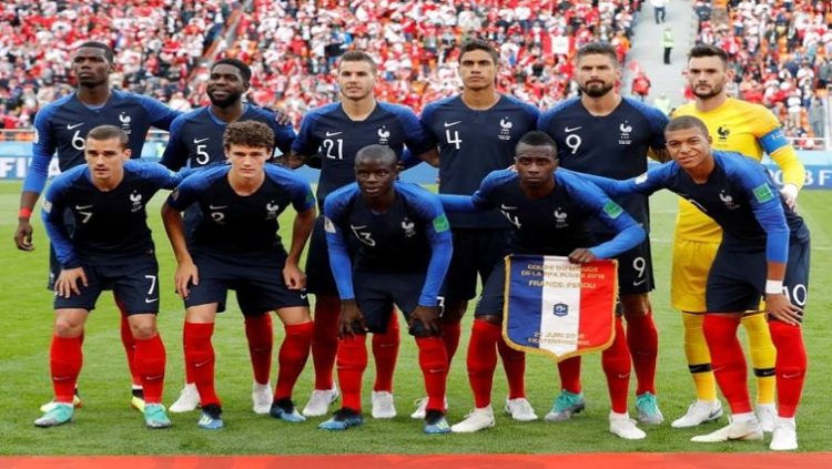 File | France players pose for a team group photo before the match against at Ekaterinburg Arena in Russia