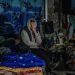 A local resident sits in an underground shelter in Avdiivka, Donetsk region, Ukraine, November 7.
