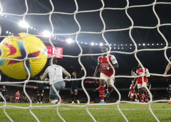 Arsenal's Bukayo Saka celebrates scoring their first goal.