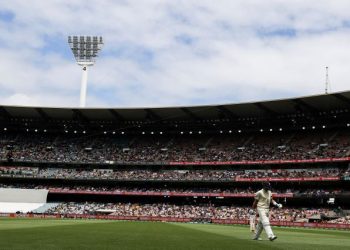 Joe Root of England leaves the pitch after being dismissed by Mitchell Starc of Australia in the third Ashes test at Melbourne Cricket Ground in Melbourne, Australia, December 26, 2021