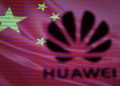 A 3-D printed Huawei logo is seen in front of displayed flag of China and cyber code in this illustration, taken February 12, 2019.