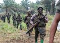 Congolese soldiers from the Armed Forces of the Democratic Republic of Congo (FARDC) walk in line after the army took over an ADF rebel camp, near the town of Kimbau, North Kivu Province, Democratic Republic of Congo, February 20, 2018.