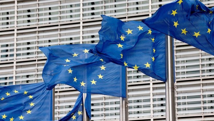 European Union flags flutter outside the EU Commission headquarters in Brussels, Belgium, September 28, 2022.
