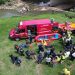 Search teams are pictured in an aerial view along the banks of the Jukskei River in the north of Johannesburg, 21 November 2022.