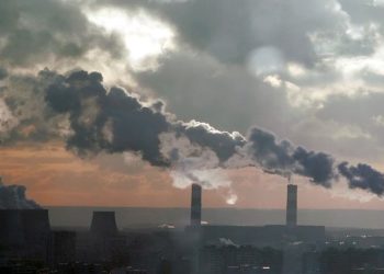 [File Image] : Smoke billows from the chimneys of a power station that produces heat and electricity in southern Moscow.