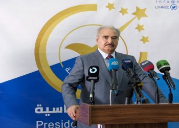 Libya's eastern commander Khalifa Haftar speaks to the media after submitting his candidacy papers for the presidential elections at the office of the High National Elections Commission, in Benghazi, Libya November 16, 2021.