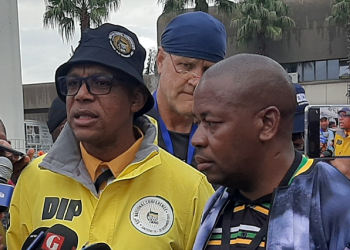 Pule Mabe (left) and Mzwandile Masina (right) briefing the media at Nasrec about Masina's candidacy  withdrawal.
