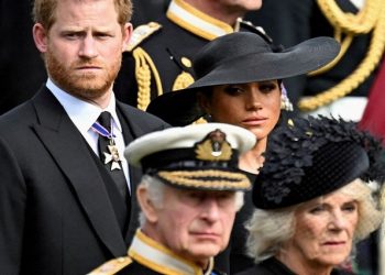 Britain's Meghan, Duchess of Sussex, cries as she, Prince Harry, Duke of Sussex, Queen Camilla and King Charles attend the state funeral and burial of Britain's Queen Elizabeth, in London, Britain, September 19, 2022.