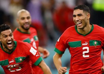 FIFA World Cup Qatar 2022 - Round of 16 - Morocco v Spain - Education City Stadium, Al Rayyan, Qatar - December 6, 2022 Morocco's Achraf Hakimi celebrates after scoring the winning penalty during the penalty shootout as Morocco progress to the quarter finals