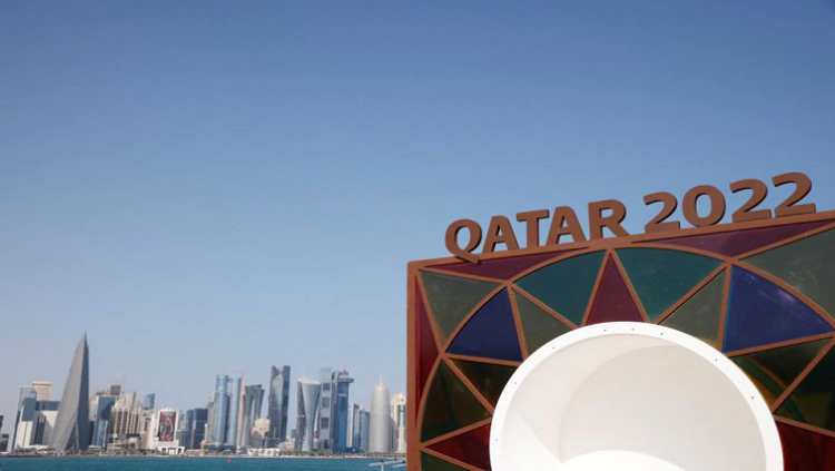 Soccer Football - 2022 World Cup Preview - Doha, Qatar - November 10, 2022 A Qatar 2022 logo is seen in front of the skyline of the West Bay in Doha REUTERS/John Sibley/File Photo