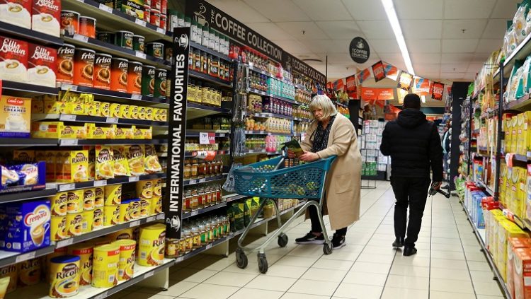 [File Image]: A  woman shops at a grocery store in East London, in the Eastern Cape province, South Africa, July 7, 2022.