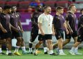 Germany coach Hansi Flick with teammates during training.