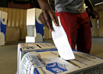 A man casts his vote during elections in SA