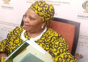 National Assembly Speaker Nosiviwe Mapisa-Nqakula holding the report of the Section 89 Independent Panel after receiving from panel Chairperson, the retired Chief Justice Sandile Ngcobo