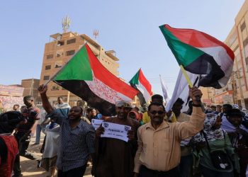 Protesters march during a rally against a signed framework deal between political parties and the military that provides for a two-year civilian-led transition towards elections and would end a standoff triggered by a coup in October 2021, in Khartoum, Sudan December 8, 2022.