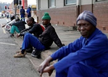 [File Image]: Unemployed men wait on a street corner in the hope of getting casual work in Pietermaritzburg, South Africa June 28, 2017. REUTERS/Rogan Ward