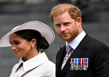 [File Photo) Prince Harry and his wife Meghan, Duchess of Sussex, leave after the National Service of Thanksgiving held as part of celebrations marking the Platinum Jubilee of Britain's Queen Elizabeth, in London. REUTERS/Dylan Martinez