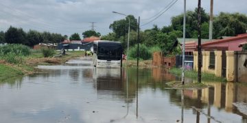Bus stuck on a flooded road in Soweto.