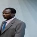 Dominic Ongwen, a former senior commander in the rebel Lord's Resistance Army, enters the hearing room at the International Court in The Hague, Netherlands, December 6, 2016.
