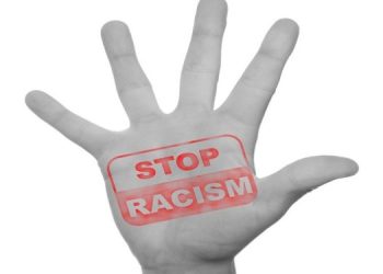 Graphic of a hand opposing racism.