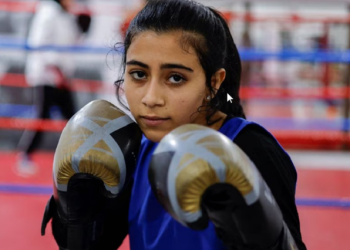 [1/4] A Palestinian girl warms up during training inside the first women boxing center in Gaza City January 17, 2023. REUTERS