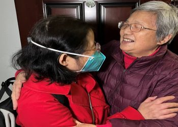 [File Image] : Chu Wenhong hugs her mother as she arrives from Singapore ahead of the Chinese Lunar New Year, her first time home since the coronavirus disease (COVID-19)