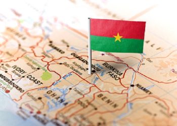 The flag of Burkina Faso pinned on the map.