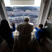 Pope Francis leads the Angelus prayer from his window at the Vatican.