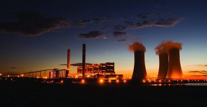 An Eskom power station seen at night.