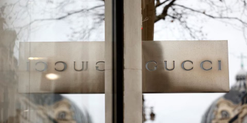 [File photo] A Gucci sign is seen outside a shop in Paris, France, January 27, 2023.