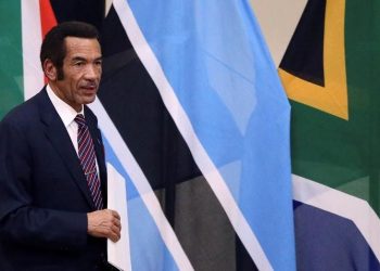 Botswana's former President Ian Khama returns to his seat after giving a speech during the Botswana-South Africa Bi-National Commission (BNC) in Pretoria, South Africa, November 11, 2016.