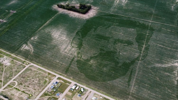 FILE PHOTO: The face of Argentine football star Lionel Messi is depicted in a corn field sown with a special algorithm to plant seeds in a certain pattern to create a huge visual image when the corn plants grow, in Los Condores, on the outskirts of Cordoba, Argentina January 15, 2023.
