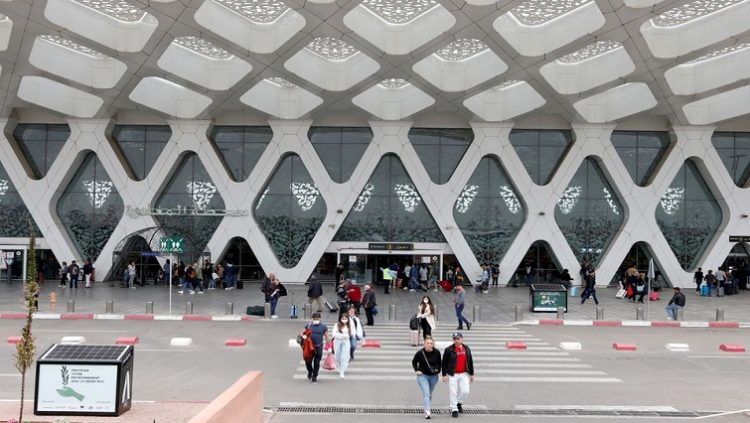 Tourists wait to be repatriated to their countries as Morocco suspends flights to European countries over coronavirus disease (COVID-19) fears, at Marrakech airport, Morocco, March 15, 2020.